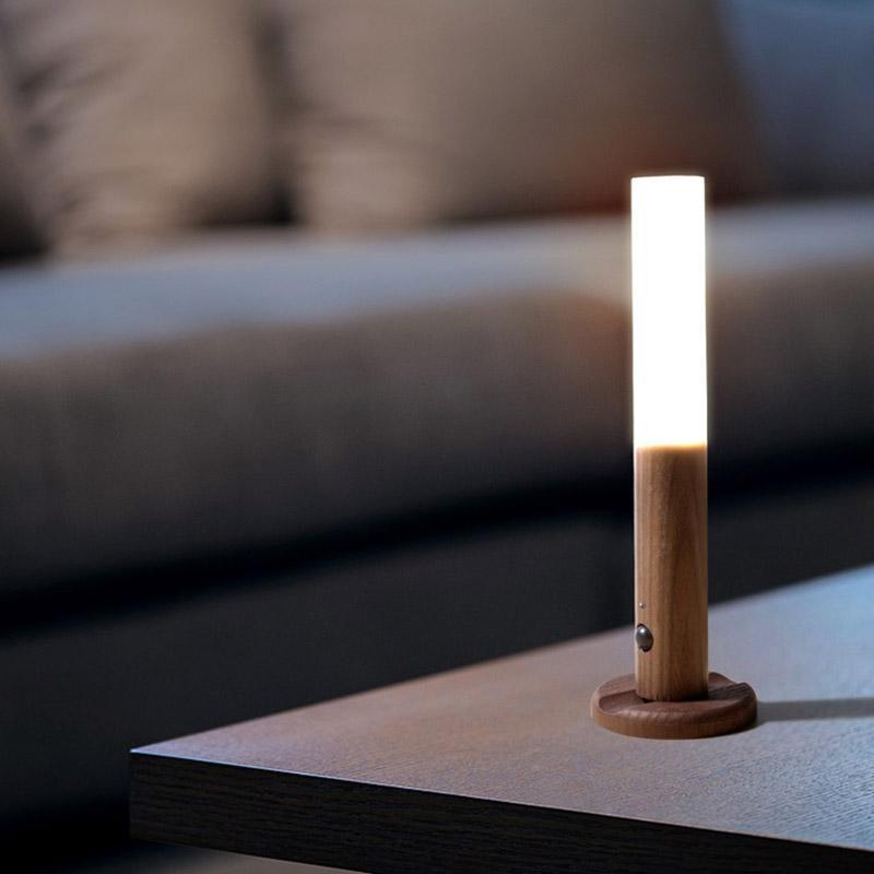 Intelligent Sensor Light with magnetic base and double-mode technology on a modern desk setting.