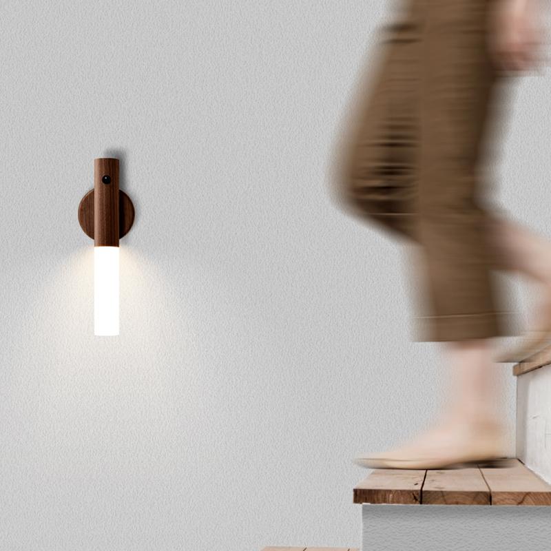 Intelligent Sensor Light with magnetic base and double-mode technology on a modern desk setting.