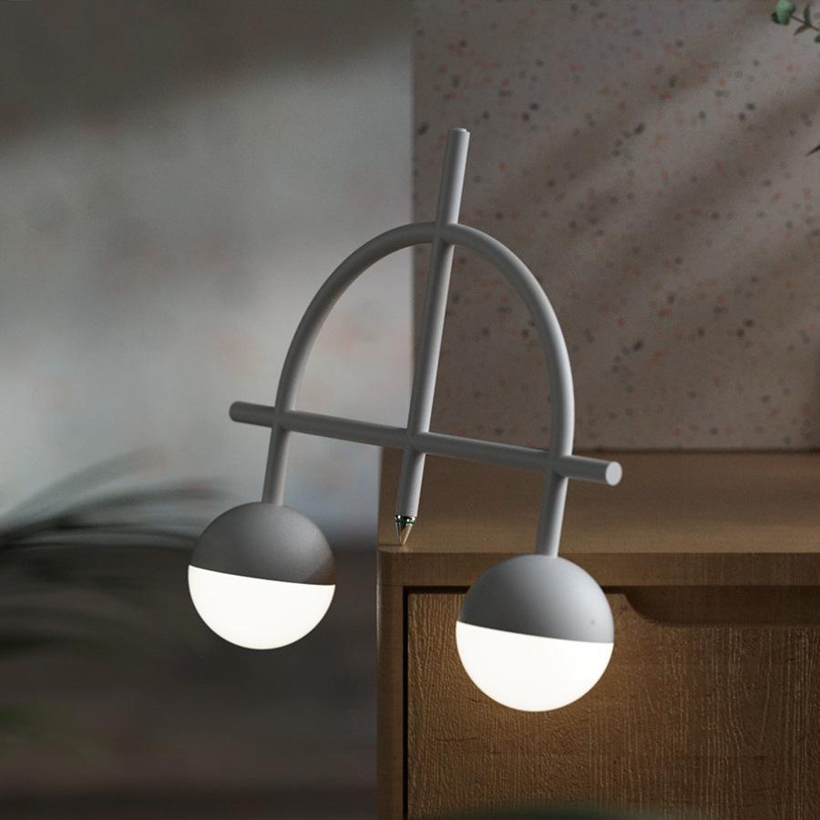 Libra Heng Balance Lamp showcasing a unique balance mechanism and modern design on LuxusHeim