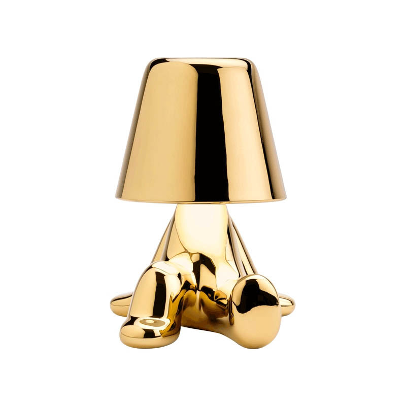 Golden Brothers Portable Table Lamp with a classic gold finish on LuxusHeim